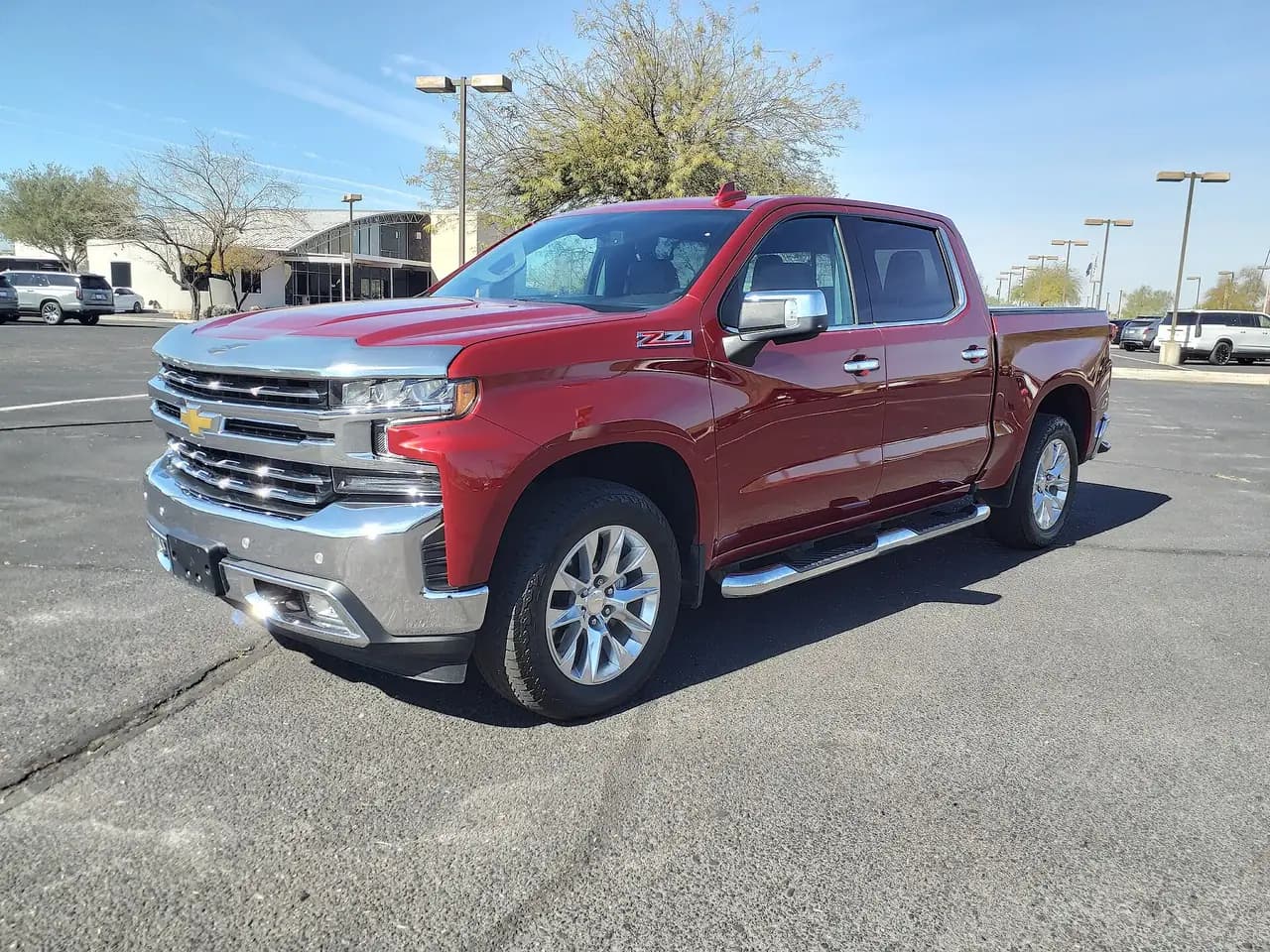 Red 2021 Chevrolet Silverado 1500 LTZ crew cab (T1), front three-quarter view