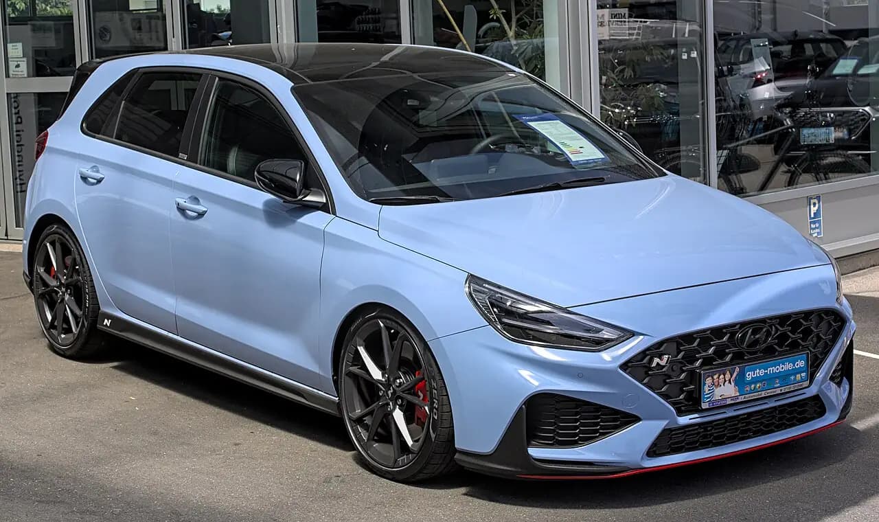 Performance Blue 2021 Hyundai i30 N hatch (PDe facelift), front three-quarter view