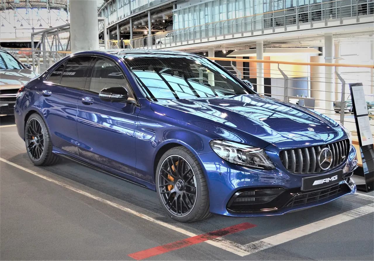 Blue Mercedes-AMG C 63 S sedan (W205 facelift), front three-quarter view