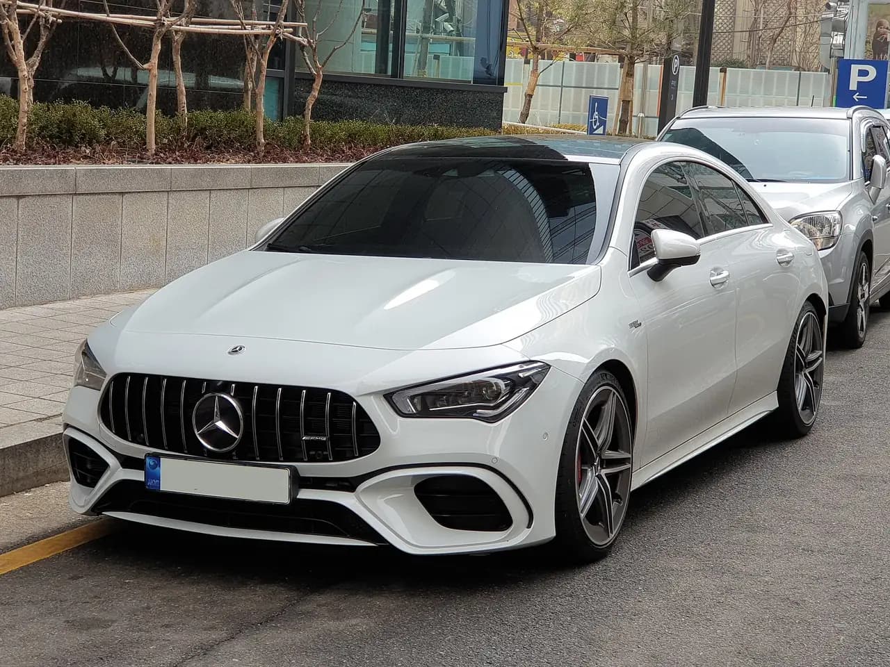 White Mercedes-AMG CLA 45 S 4MATIC+ coupe (C118), front three-quarter view