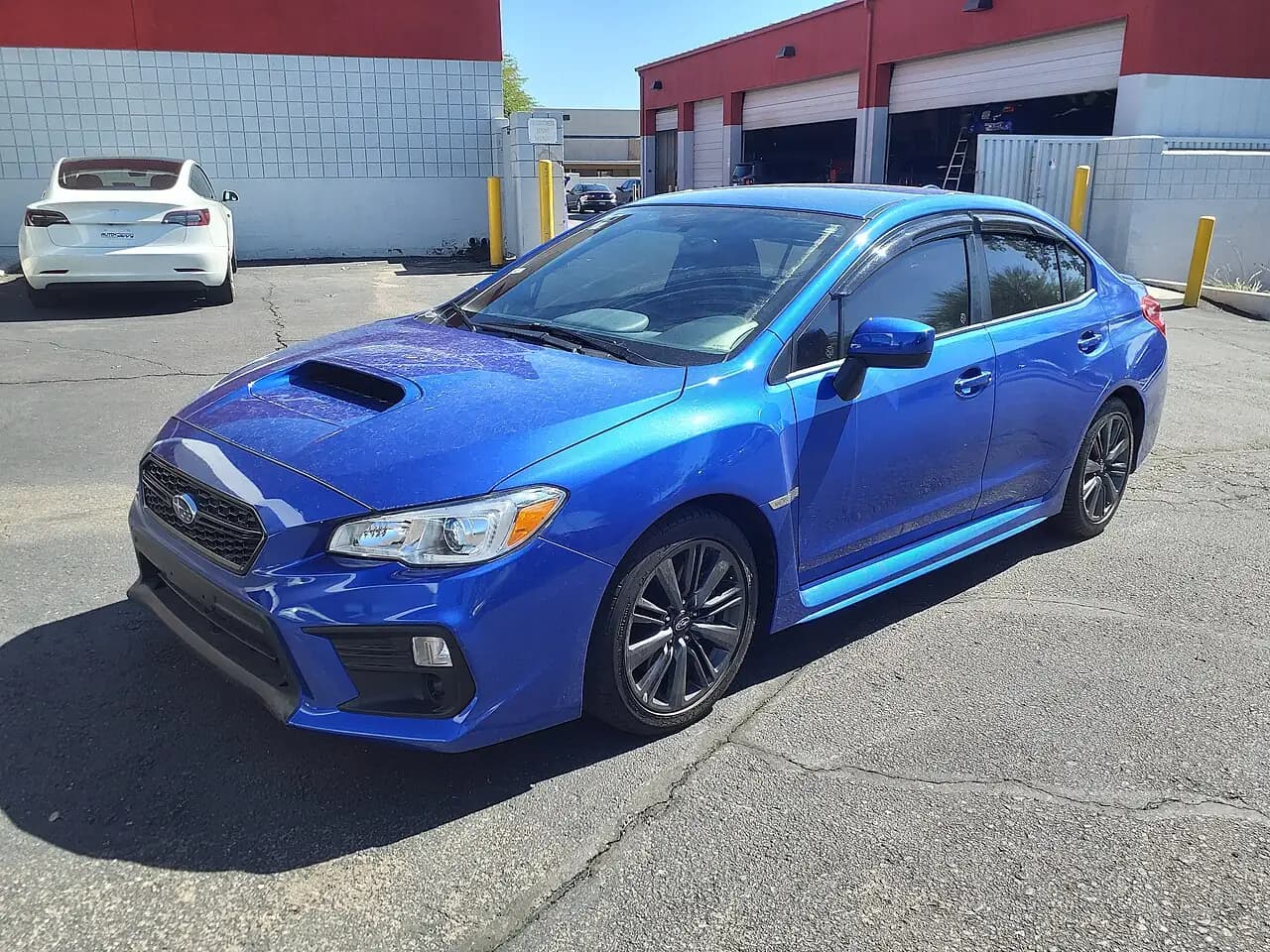 Blue 2020 Subaru WRX sedan (VA facelift), front three-quarter view