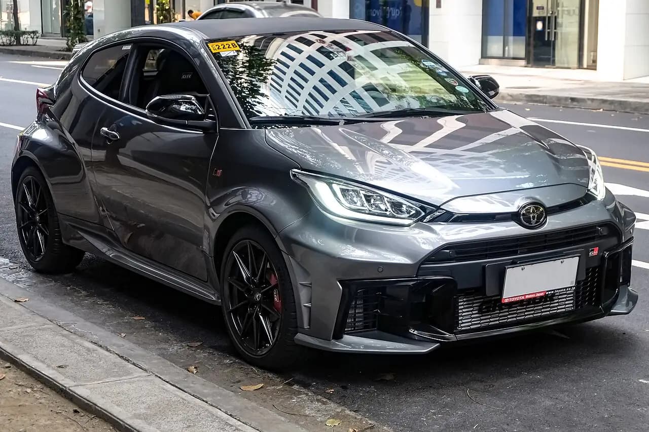 Precious Metal grey Toyota GR Yaris (GXPA16 facelift) hatchback, front three-quarter view