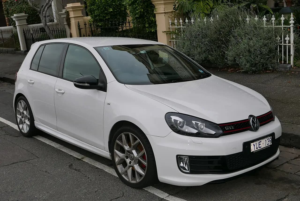 White MY12 Volkswagen Golf GTI Edition 35 (Mk6) 5-door hatchback, front three-quarter view