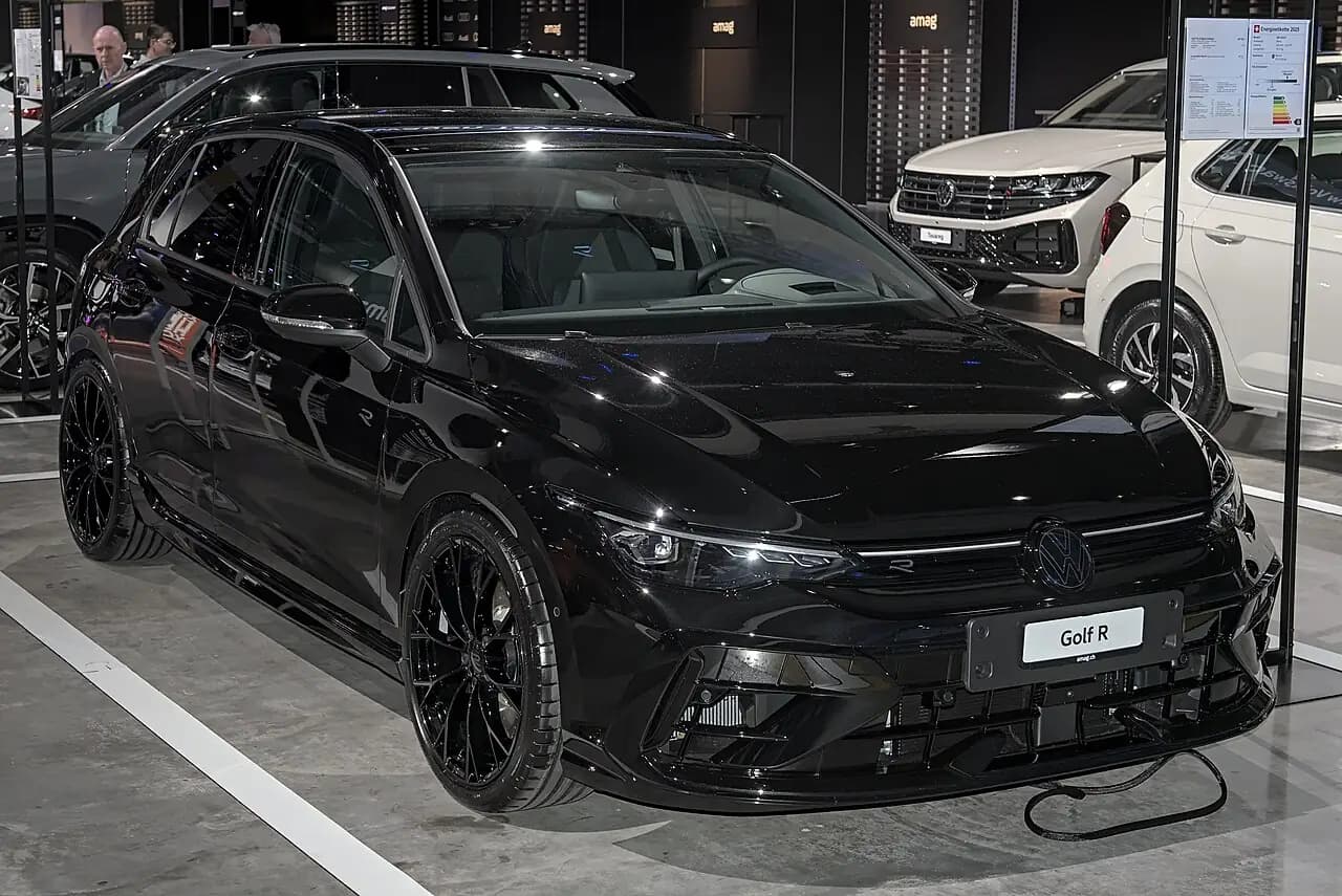 Black Volkswagen Golf R Black Edition (Mk8.5) hatchback, front three-quarter view