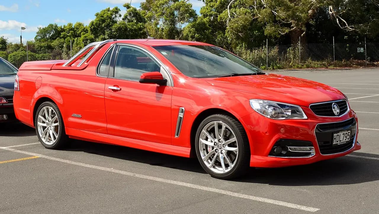 Red 2013 Holden Ute SS (VF), front three-quarter view in a car park
