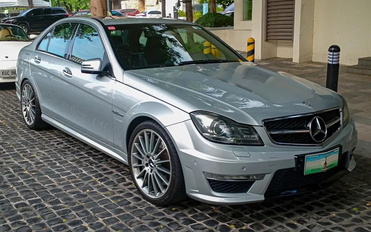 Silver 2012 Mercedes-Benz C 63 AMG sedan (W204 facelift), front three-quarter view