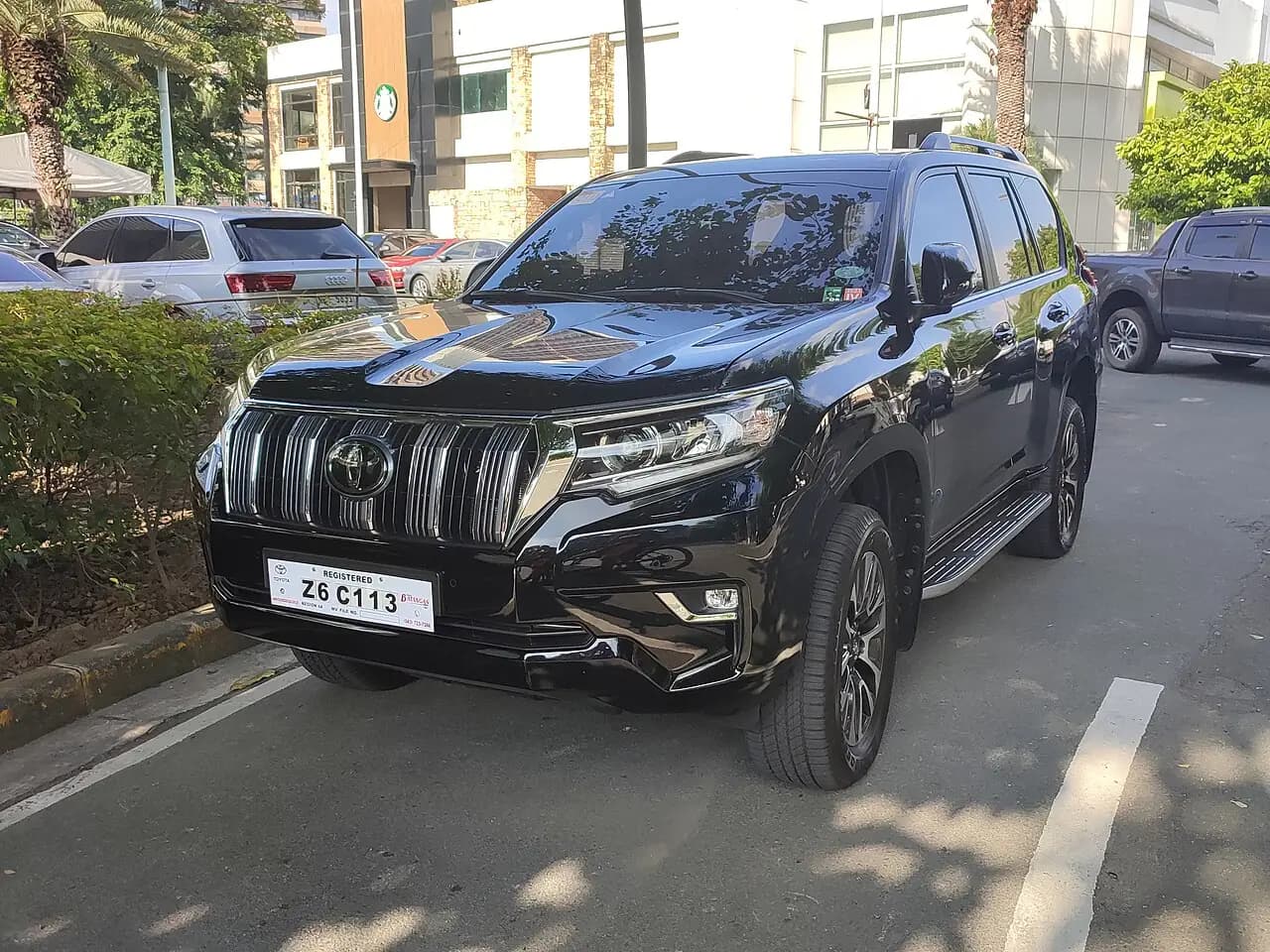 Black 2023 Toyota LandCruiser Prado VX (150 Series), front three-quarter view